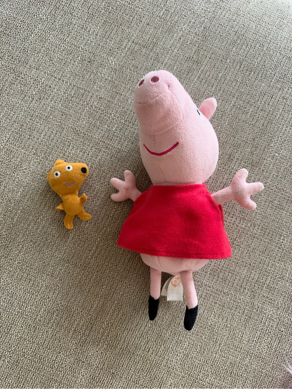 Small Peppa pig and teddy bear